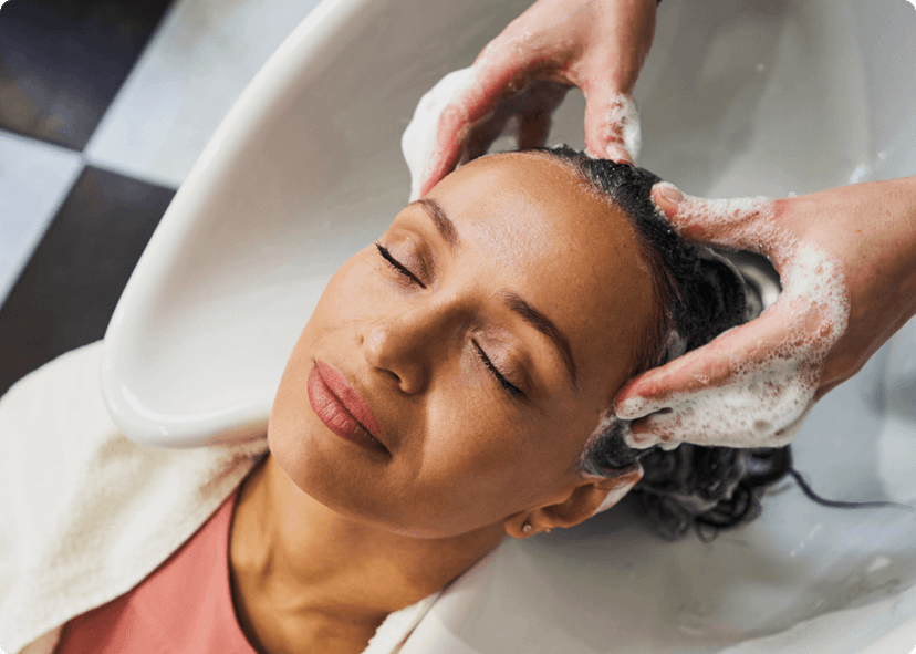 woman having her hair washed